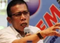 Masinton Pasaribu Menyikapi Gibran Tak Kembalikan KTA Partai